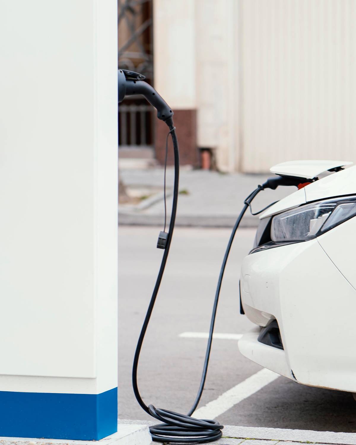 side-view-car-being-charged-electric-vehicle-charging-station(1)